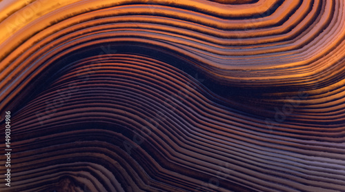 contrast orange and brown lines closeup of agate
