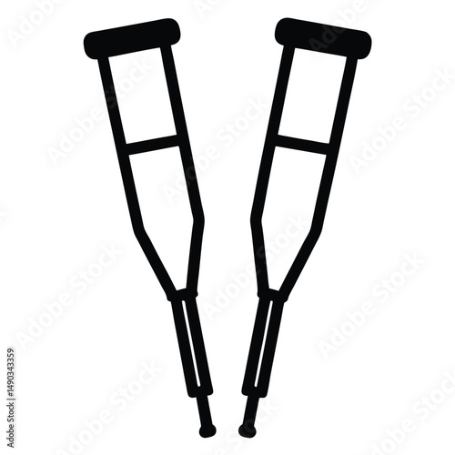 a pair of crutches standing side by side