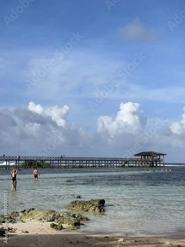 Wooden Walkway Over Turquoise Water - Coastal Pavilion