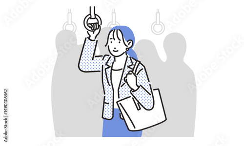 電車で通勤する女性