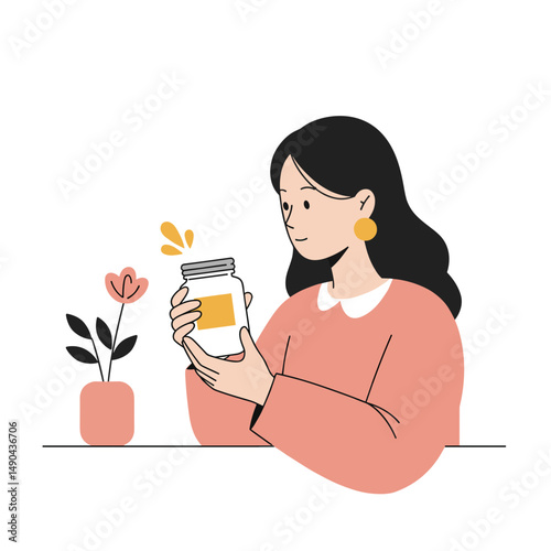Woman reading label on jar while sitting at table with plant  