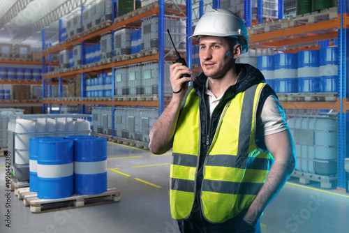 Man in chemical warehouse. ...