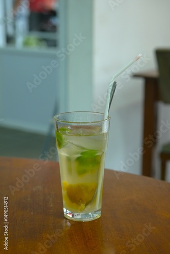Songkit iced drink on the table. Summer drink, tropical drink concept. Es jeruk