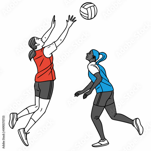 Two female volleyball players spiking and diving