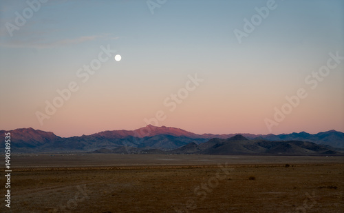 The Serene Beauty of Moonset Over Arizona’s Cerbat Mountains