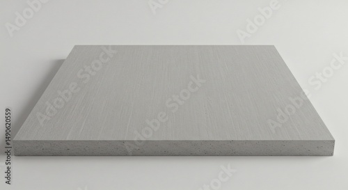 Minimalist gray platform product display stand for showcasing items in a studio setting backdrop 100 chars