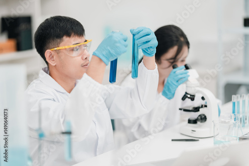 Laboratory team engaged in ...