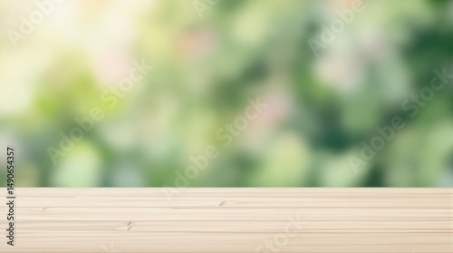 Wooden table with blurred green background