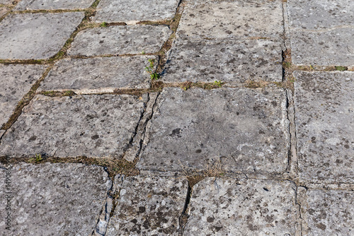Foto Surface of court of ancient castle lined with stone slabs