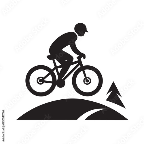 Mountain Biker On Rugged Trail