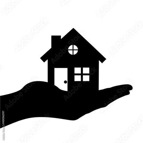 Hand holding silhouette of a house symbolizing protection and care 