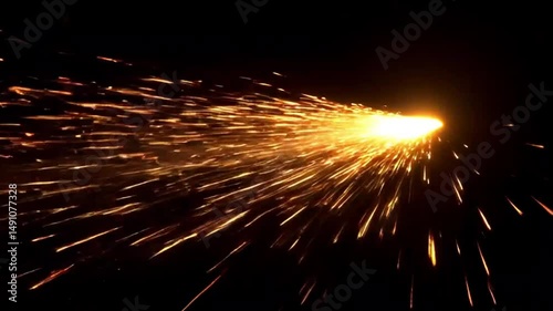 fireworks, a multitude of sparks flying out from a bright central light source against a dark background.