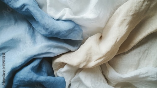 Close-up view of three different linen fabric swatches.