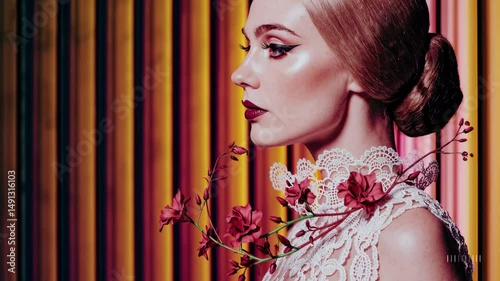 Vibrant fashion transformation: artistic portrait with floral elements and dynamic motion