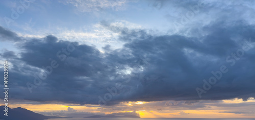 Sunset sky. Dramatic sky view. Sunlight over the sea