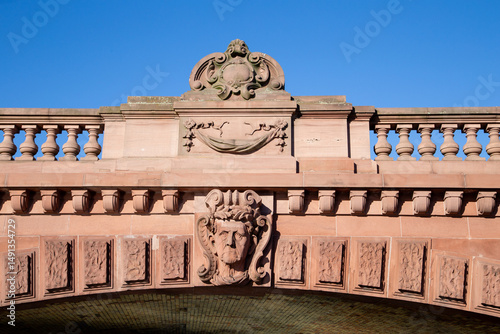 detail of historic sandstone bridge crossing river spree at the government area in Berlin