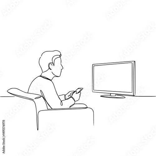Man sitting on sofa watching TV and using smartphone at home  