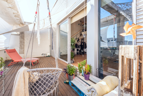 The location of the hammock is key. Finding a quiet corner, perhaps under the shade of a nearby tree or protected by an awning, will ensure an optimal relaxing experience