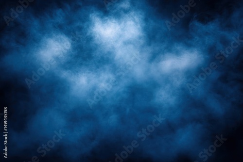 Dense blue smoke or fog creating a mysterious and ethereal atmosphere with varying shades and soft wisps spreading across a dark background