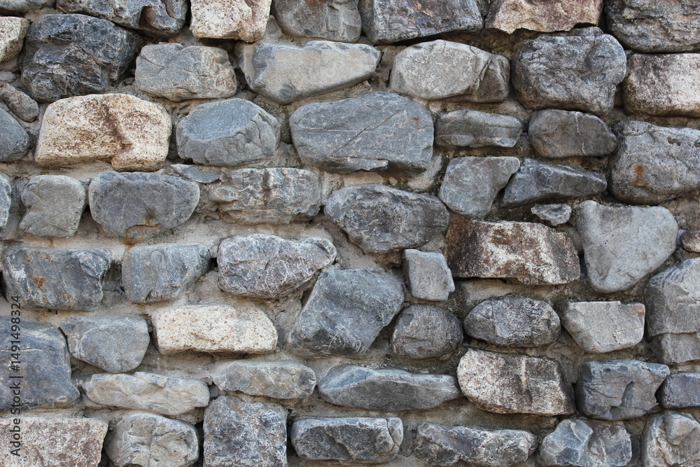 Obraz premium 石が敷き詰められた石垣