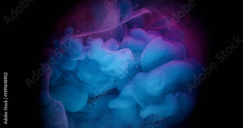 Mist art explosion. Fume blend. Blue purple mystic ink haze mix color particles cloud flow on defocused black abstract round frame background.