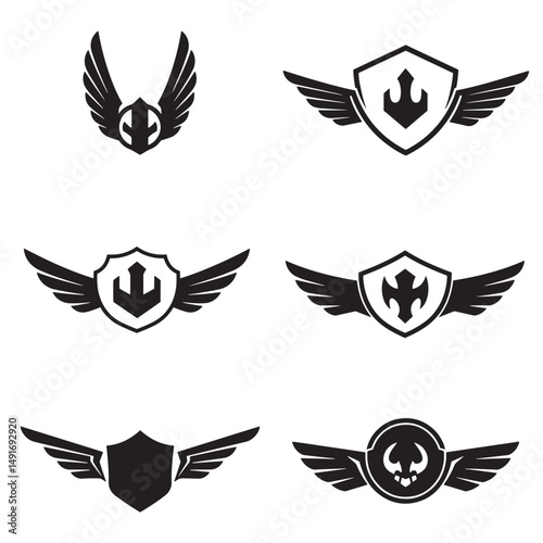Vector collection of heraldic wings badges and emblems with geometric shield and crest symbols for logos