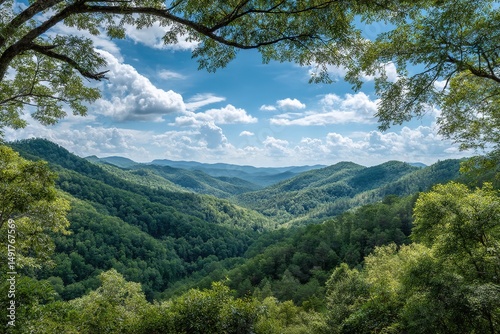 Explore the scenic mountain views: a lush green landscape under a cloudy blue sky for your next adventure