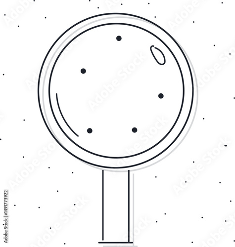 A magnifying glass or loupe shows magnified dots or specks of dust.