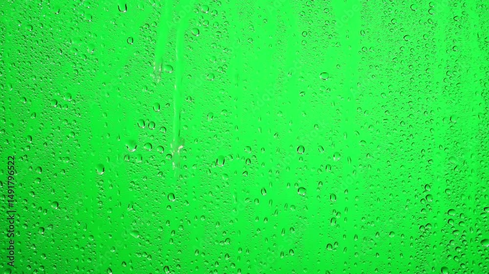 Rain drops on glass window, Rain falling green screen water drops on screen - water splashes on window glass	