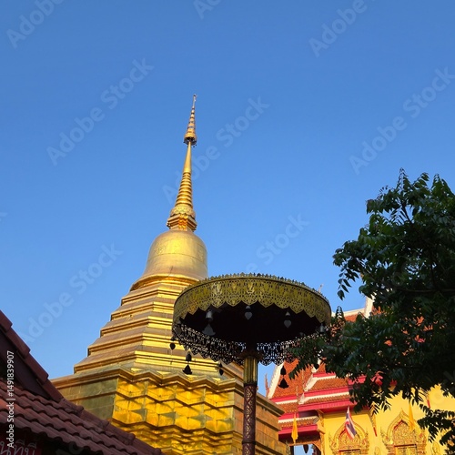 North of Thailand golden pagoda in temple with Buddha. Beautiful archaeological site