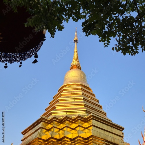 North of Thailand golden pagoda in temple with Buddha. Beautiful archaeological site