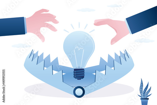 Businessman hands want catch light bulb from animal trap. Business idea trap concept. False idea, bait for losers and gullible people. Deception and fake