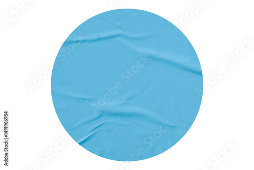 Light blue circle sticker with crumpled edges. Wrinkled round paper isolated on transparent background.