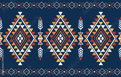 Native background pattern. Embroidery African Indigenous American ethnic fabric abstract red yellow blue orange concept.