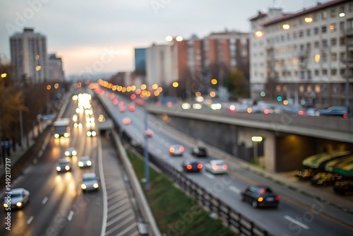 Blurred city traffic at dusk with glowing lights