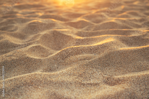 Fototapeta Naklejka Na Ścianę i Meble -  Texture of fine brown sand on the beach