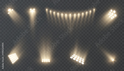 
Set of realistic spotlight beams with glowing yellow light on a transparent background. Studio stage lighting effects for shows, stages, photo zones, sports events or digital design.
