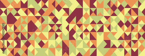 Abstract geometric textile design.  Vibrant autumnal hues in a mosaic of triangles and squares create a dynamic, visually engaging pattern perfect for backgrounds, website banners, or print projects.