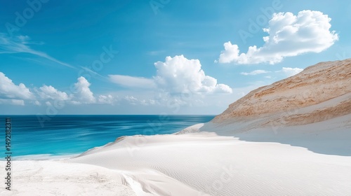 Serene coastal landscape reveals pristine sand dunes and vibrant blue ocean under a bright sky filled with picturesque clouds Generative AI