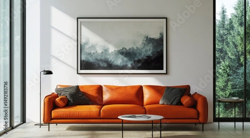 Modern living room with orange leather sofa and abstract art