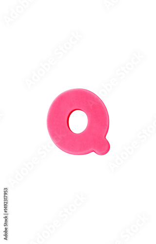 Colored clay shaped like the English letter Q. Pink color