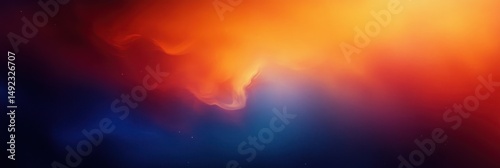 Abstract gradient background blending dark blue and vibrant orange colors with smooth flowing transitions and ethereal light effects