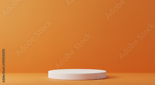 White Circular Pedestal on Orange Background