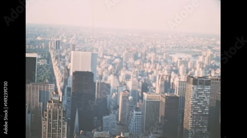 New York, United States America - 1976: Archival of Manhattan skyline with Rockefeller Center skyscraper and Pan Am Tower Airways in 1970s, now become the MetLife Building HQ insurance company.