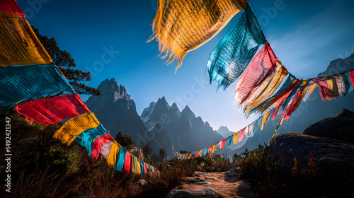 flags fluttering on a mountain pass under blue sky