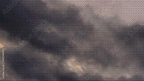 Video of dark storm clouds with a digital dithering effect. Stylized pixel texture in color. Moody and cinematic look for backgrounds, motion design, or visual effects.