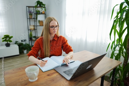 Focused study session in a cozy home workspace during daylight