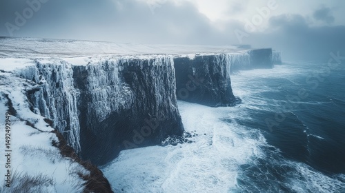 snow-covered cliffs with a dramatic ocean backdrop under a stormy winter sky, Generative AI