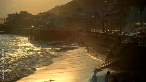 Coastal beauty of Kamakura with Enoshima silhouetted at dusk.