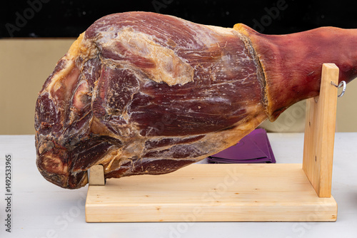 Iberian ham pata negra from Spain. hamon on the table, big foot. jamon is the national dish of Spain, dried pork leg.